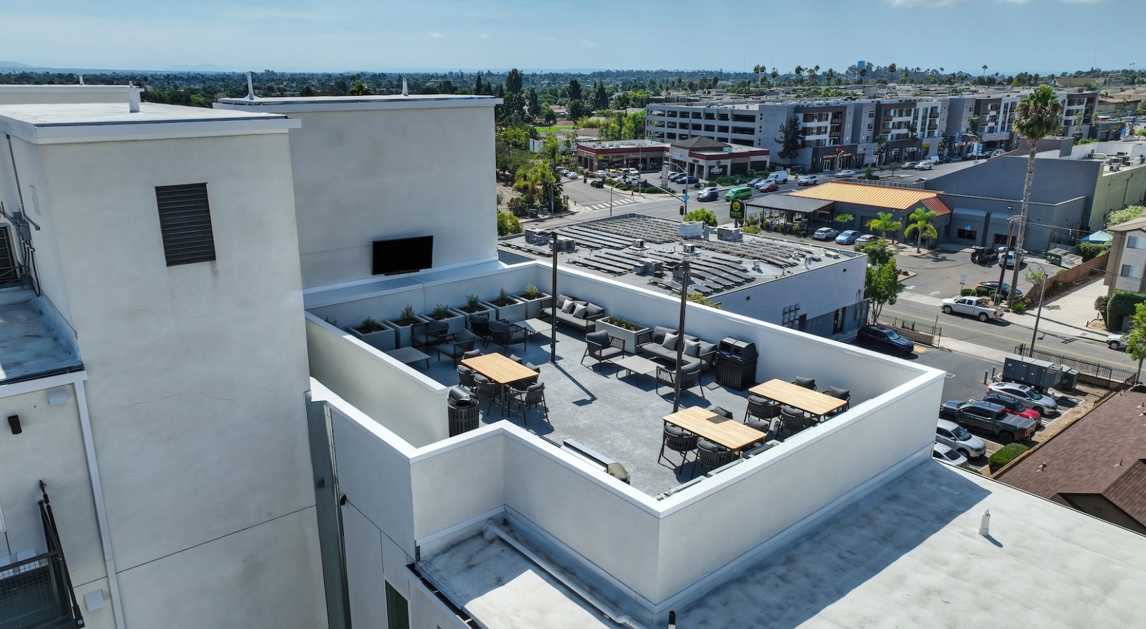 State-of-the-art amenities a rooftop lounge area over looking the city