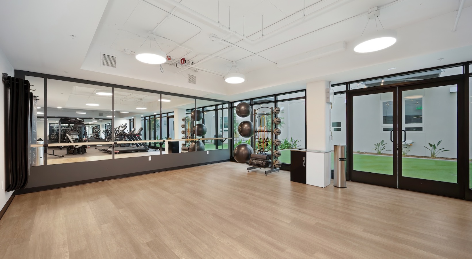 Cutting-edge amenities at your fingertips an open studio for working out with large mirrors