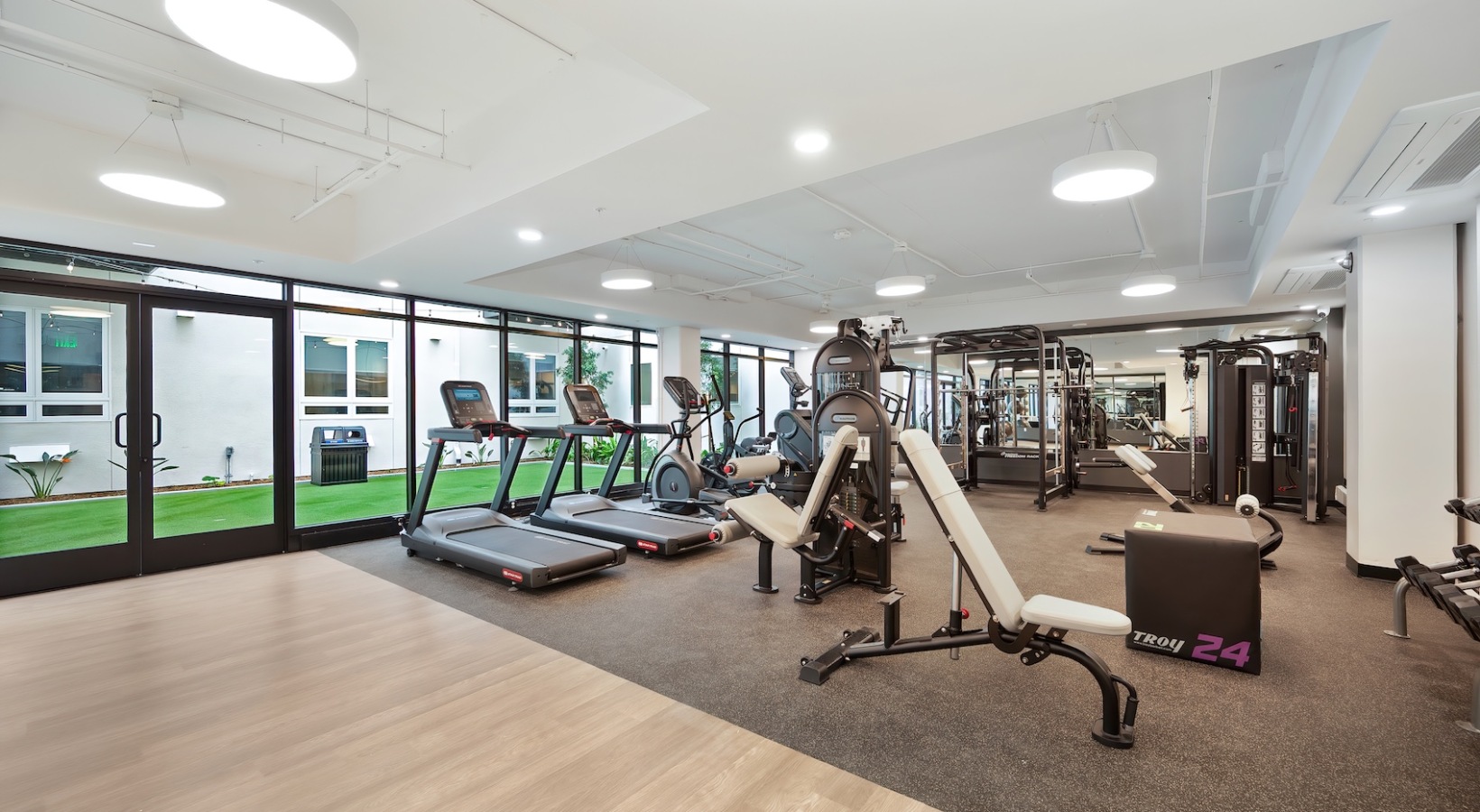 State-of-the-art amenities Open and well-lit fitness center