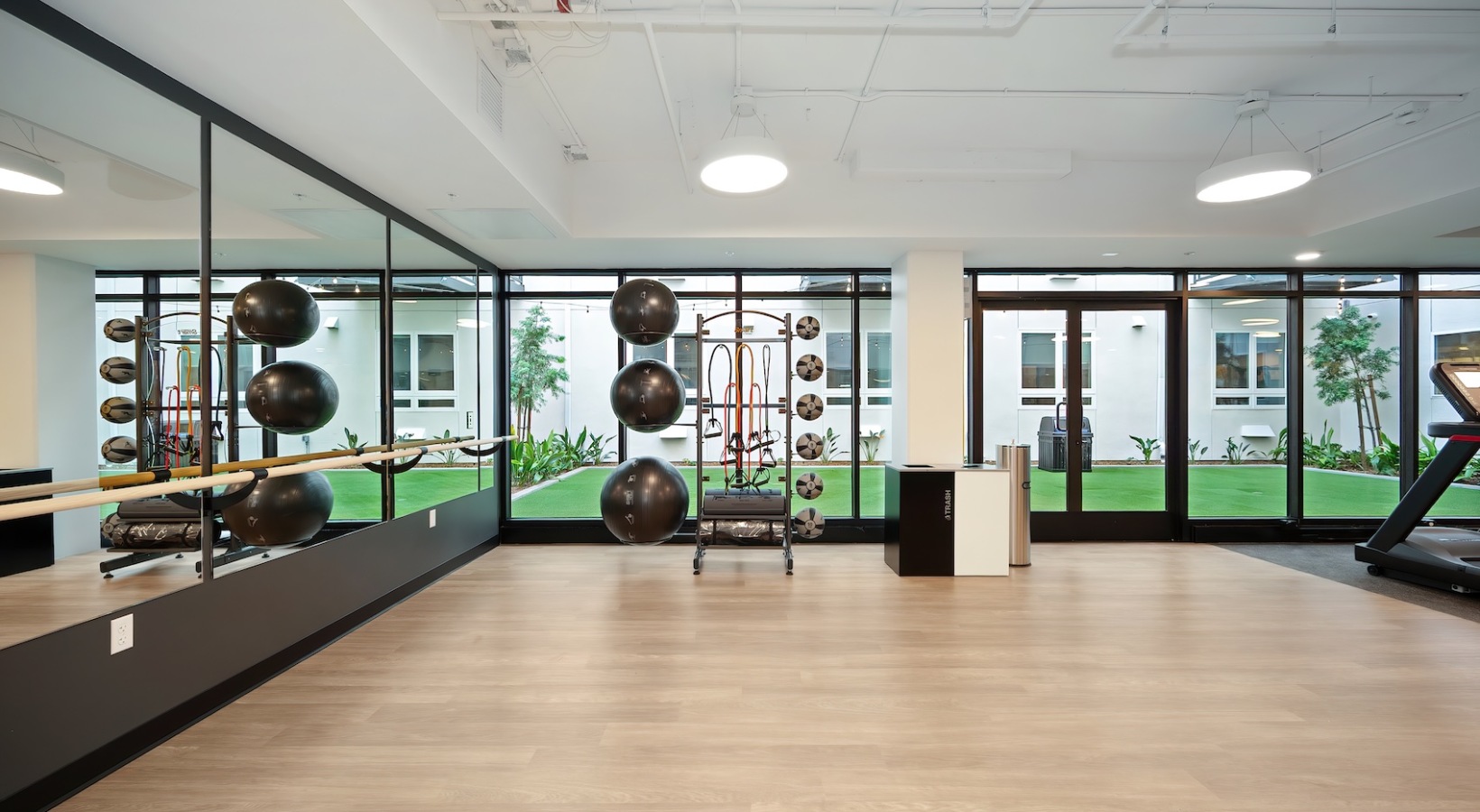 Quick access to state-of-the-art amenities Open and well-lit fitness center