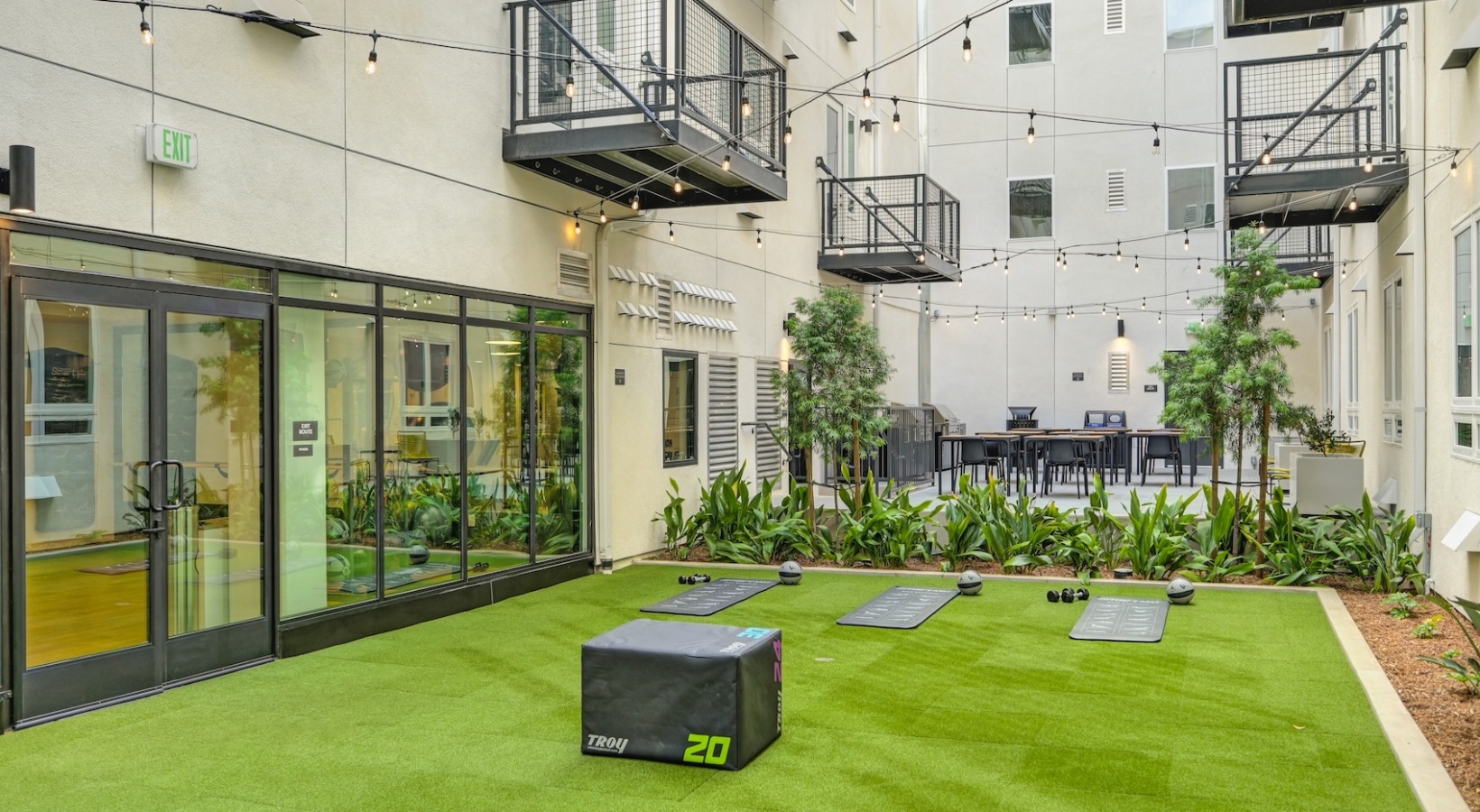 Quick access to state-of-the-art amenities a green space and activity field
