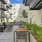 a spacious courtyard with tables and chairs
